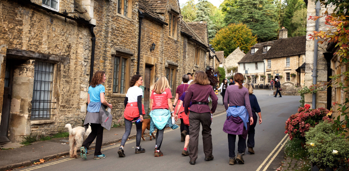 Walking up hill in Castle Combe